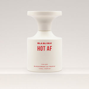 Perfume bottle labeled 'BLA BLI BLU HOT AF' on a white background