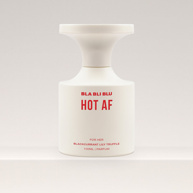Perfume bottle labeled 'BLA BLI BLU HOT AF' on a white background