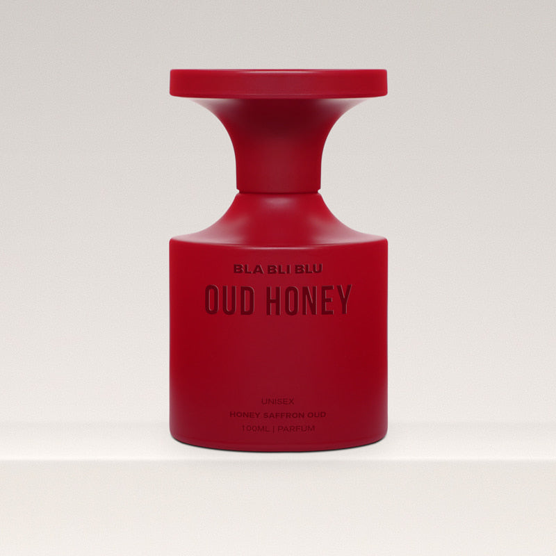 Red oud honey perfume bottle labeled 'Oud Honey' by BLA BLI BLU on a white background