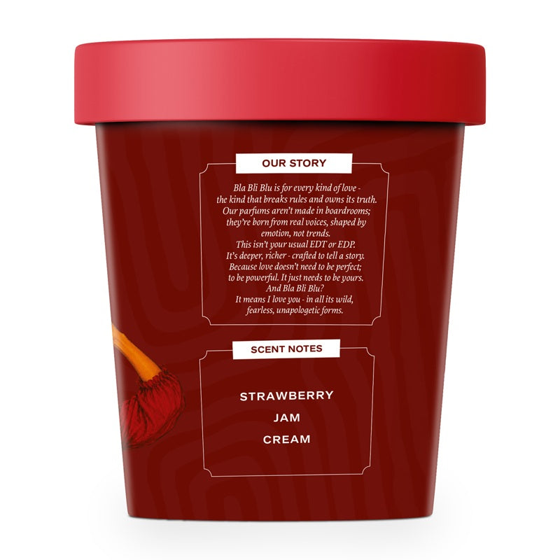 A red plastic jar candle with a matching red lid, featuring white text labels on the front that read 'OUR STORY' and SCENT NOTES.