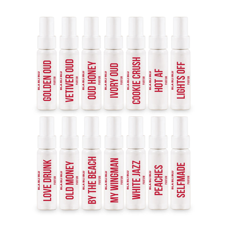 Set of 15 small perfume bottles with red text on a white background