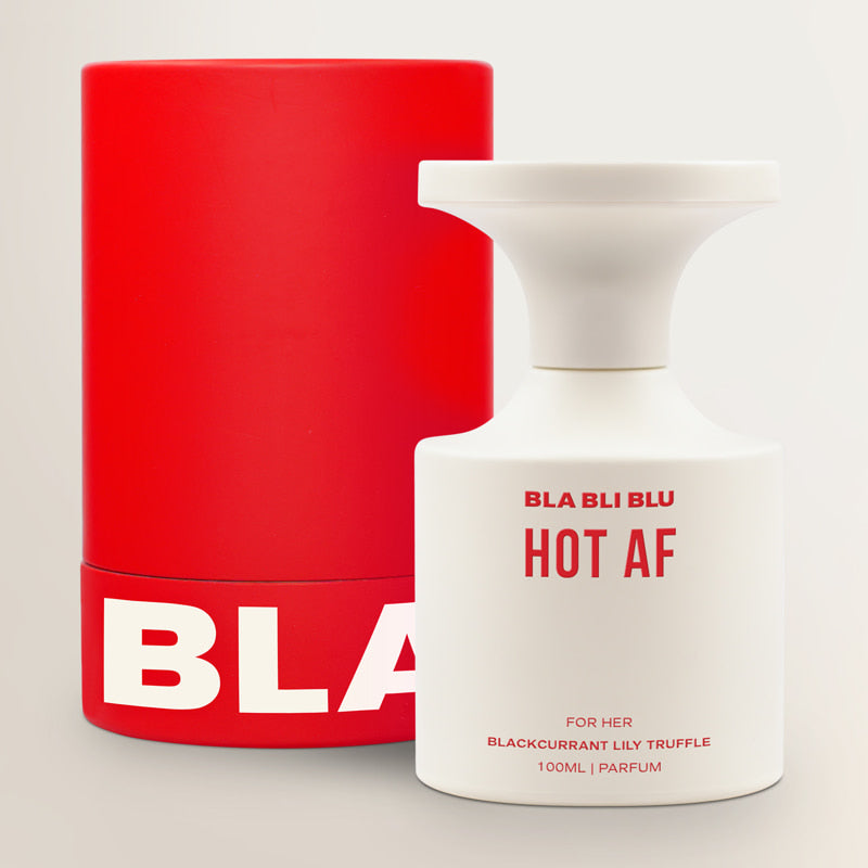 Red and white 'BLA BLU' perfume bottle with text on a light gray background
