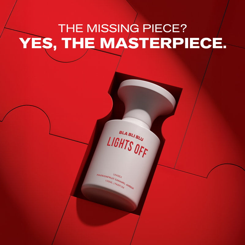 White bottle labeled 'LIGHTS OFF' on a red background with text 'THE MISSING PIECE? YES, THE MASTERPIECE.'