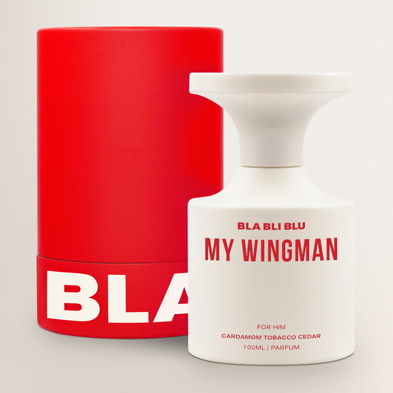 Red cylindrical container and white Men Perfume bottle with 'BLA BLU' branding on a light gray background