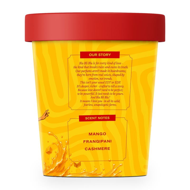 A yellow scented candle container with a red lid, featuring printed text sections for 'Our Story' and 'Scent Notes'