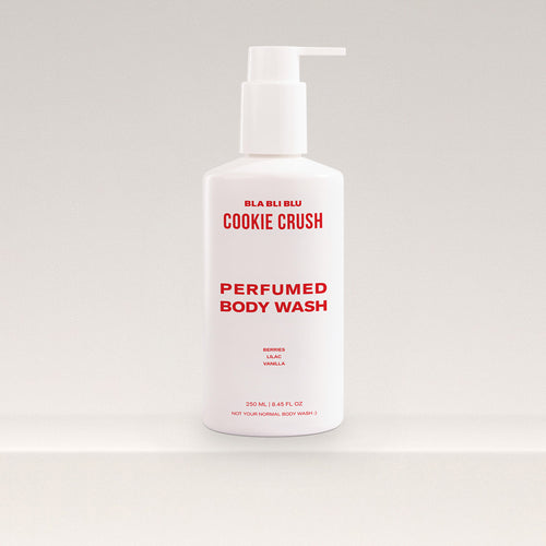 Perfumed body wash bottle labeled Cookie Crush on a light gray background