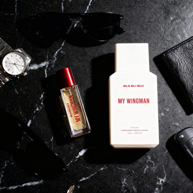 Two perfume bottles labeled  MY WINGMAN