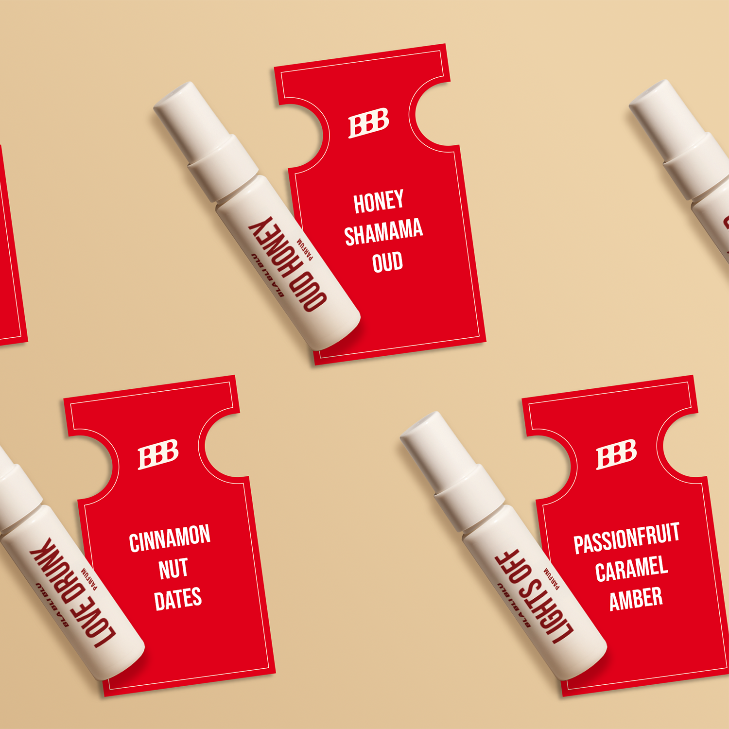 Red and white perfume bottles with labels on a beige background