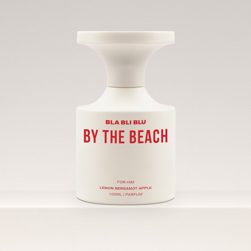 Perfume bottle labeled 'By the Beach' by BLA BLI BLU on a white background