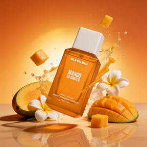 A bottle of BLA BLU Mango So Gated perfume stands upright on a glossy orange surface with a reflective base. 
